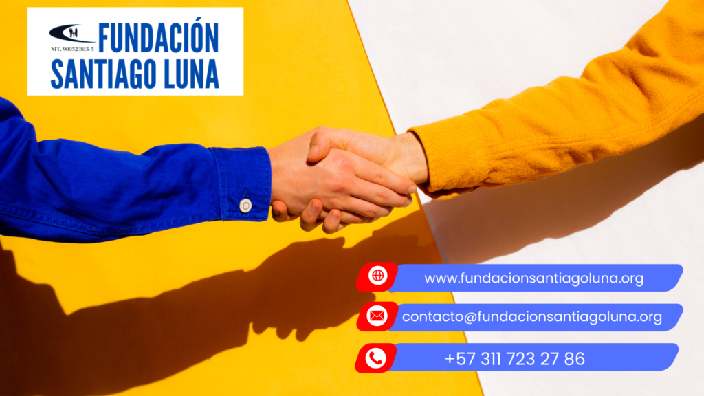 En imagen se mustran dos brazos, uno de manga azul, representando a la fundación y otro de manga amarilla, representando la universidad del Cauca, mientras estrechan sus manos en señal del convenio o alianza